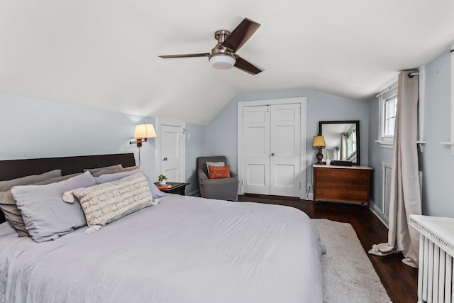 1414 Lincoln St, Evanston, IL 60201 - bedroom featuring lofted ceiling, dark wood finished floors, a closet, and a ceiling fan