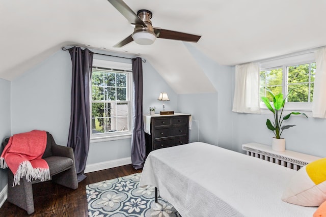 1414 Lincoln St, Evanston, IL 60201 - bedroom featuring wood finished floors, vaulted ceiling, a ceiling fan, and radiator