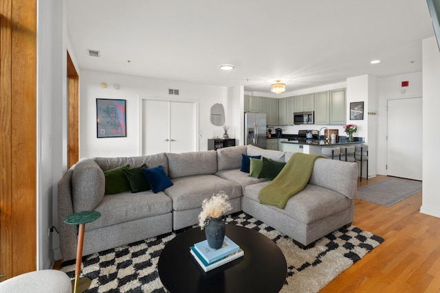 1444 N Orleans St Unit 6C, Chicago, IL 60610 - living room with light wood-type flooring and recessed lighting