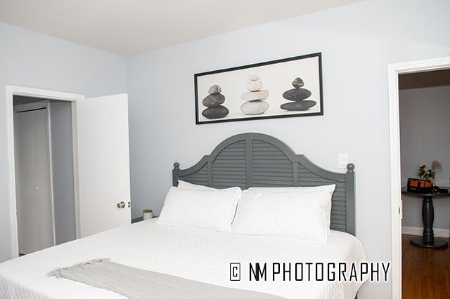1942 E 74th St Unit 3B, Chicago, IL 60649 - bedroom featuring wood finished floors and baseboards
