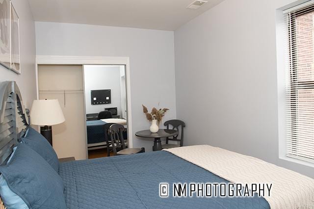1942 E 74th St Unit 3B, Chicago, IL 60649 - bedroom featuring a closet