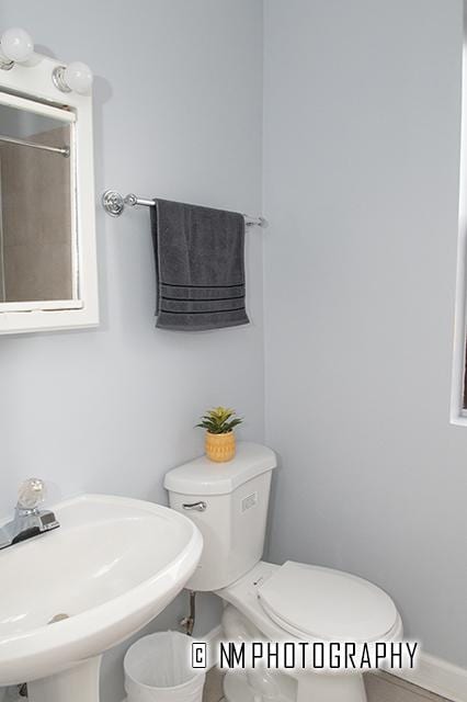 1942 E 74th St Unit 3B, Chicago, IL 60649 - bathroom featuring a sink and toilet