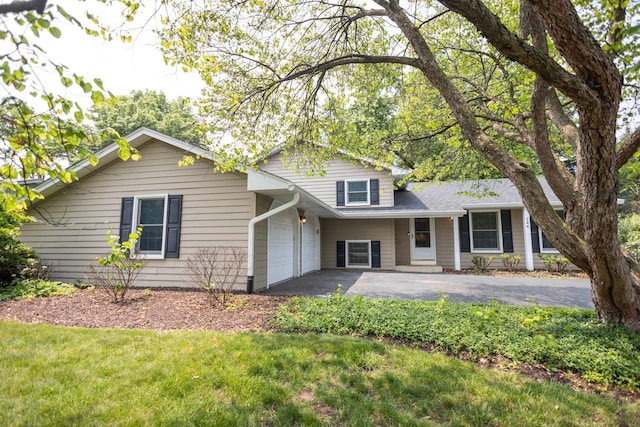0N244 Peter Rd, Winfield, IL 60190 - view of front of home with asphalt driveway and a garage