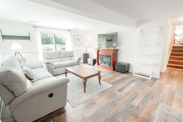 0N244 Peter Rd, Winfield, IL 60190 - living room featuring wood finished floors, stairway, and a fireplace