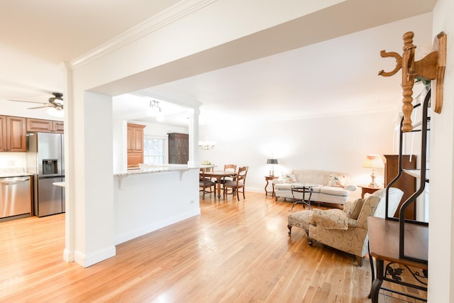 0N244 Peter Rd, Winfield, IL 60190 - living area with crown molding, light wood-type flooring, and a ceiling fan