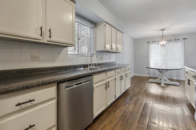 1 W Pheasant Trl, Lake In The Hills, IL 60156 - kitchen featuring stainless steel dishwasher, a sink, dark wood finished floors, dark countertops, and backsplash