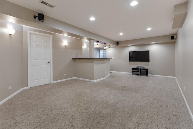 1 W Pheasant Trl, Lake In The Hills, IL 60156 - finished below grade area with carpet flooring, baseboards, and recessed lighting