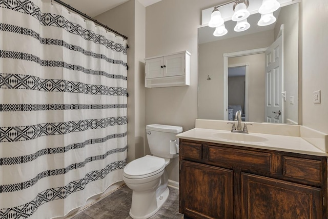 1 W Pheasant Trl, Lake In The Hills, IL 60156 - bathroom with toilet, vanity, a shower with curtain, and baseboards