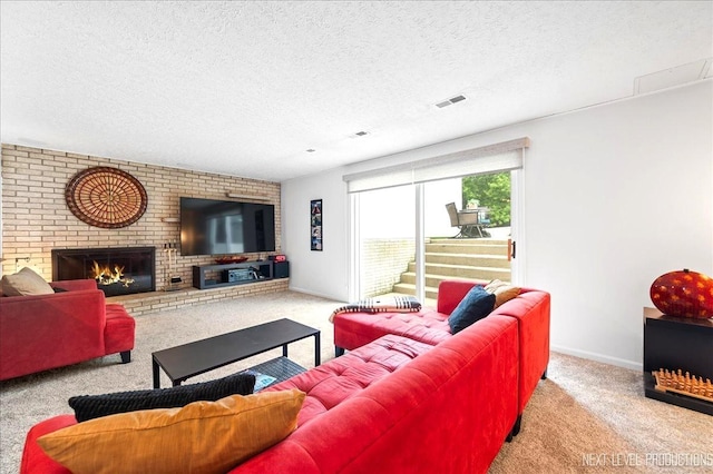 636 Cambridge Dr, Schaumburg, IL 60193 - carpeted living area featuring a textured ceiling and a fireplace
