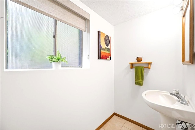 636 Cambridge Dr, Schaumburg, IL 60193 - bathroom with tile patterned flooring and a textured ceiling