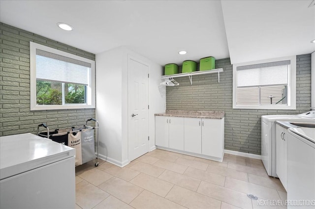 636 Cambridge Dr, Schaumburg, IL 60193 - laundry area with washer and clothes dryer, cabinet space, light tile patterned flooring, and recessed lighting