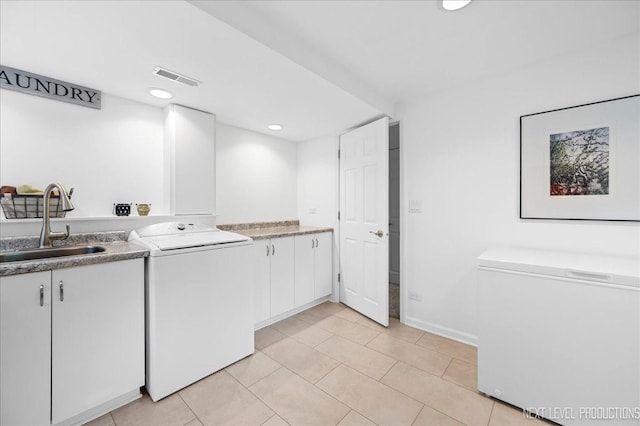 636 Cambridge Dr, Schaumburg, IL 60193 - kitchen with fridge, light countertops, light tile patterned floors, recessed lighting, and white cabinets