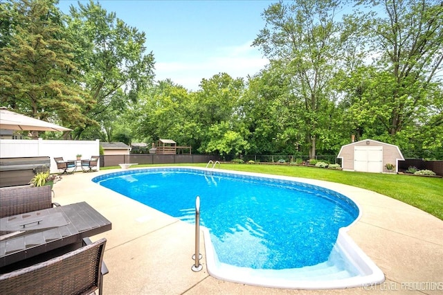 636 Cambridge Dr, Schaumburg, IL 60193 - view of pool featuring a storage shed, a fenced backyard, a patio area, and view of scattered trees