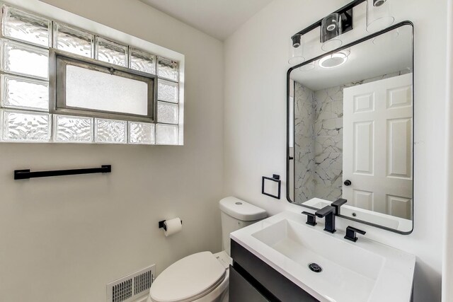 839 N Kildare Ave, Chicago, IL 60651 - full bathroom with toilet, vanity, and a shower