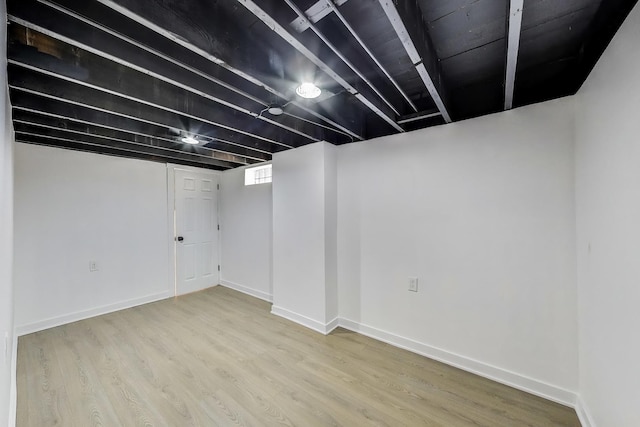 839 N Kildare Ave, Chicago, IL 60651 - basement featuring wood finished floors and baseboards