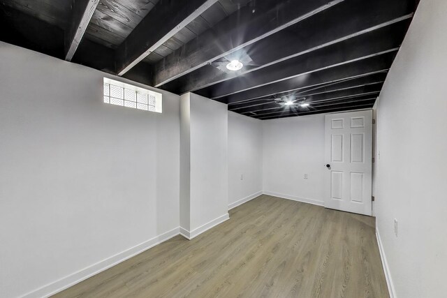 839 N Kildare Ave, Chicago, IL 60651 - below grade area with wood finished floors and baseboards