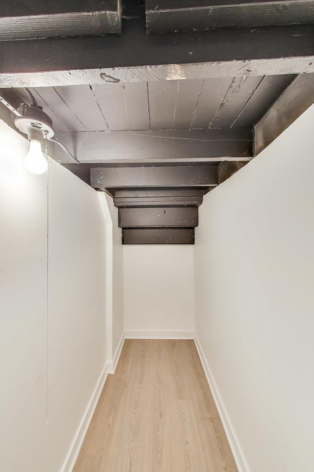 839 N Kildare Ave, Chicago, IL 60651 - basement featuring wood finished floors and baseboards