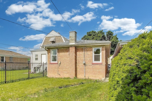 839 N Kildare Ave, Chicago, IL 60651 - back of property with a chimney and brick siding