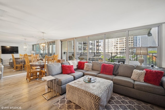 400 E Randolph St Unit 826, Chicago, IL 60601 - living area featuring light wood finished floors and a chandelier