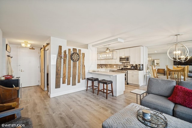 400 E Randolph St Unit 826, Chicago, IL 60601 - living area featuring light wood-type flooring and a chandelier