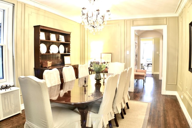 210 E Pearson St Unit 7B, Chicago, IL 60611 - dining space featuring crown molding, a chandelier, wood finished floors, a decorative wall, and baseboards