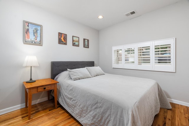 2546 W George St Unit G, Chicago, IL 60618 - bedroom with baseboards, wood finished floors, and recessed lighting