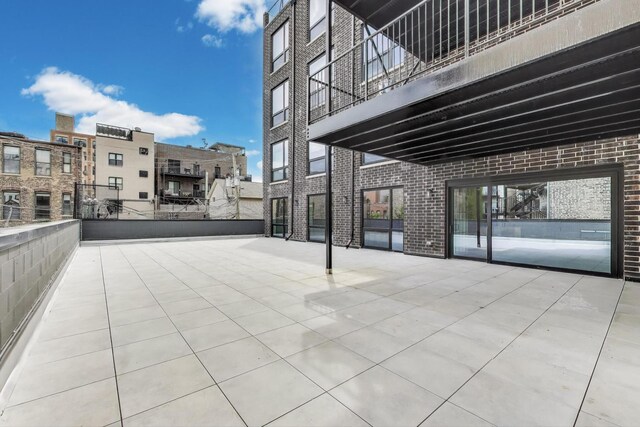 613 N Ogden Ave Unit 2E, Chicago, IL 60642 - view of patio / terrace featuring a balcony