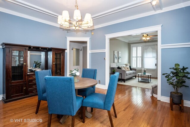 1208 W Waveland Ave Unit 1, Chicago, IL 60613 - dining area with a chandelier, wood finished floors, and ornamental molding