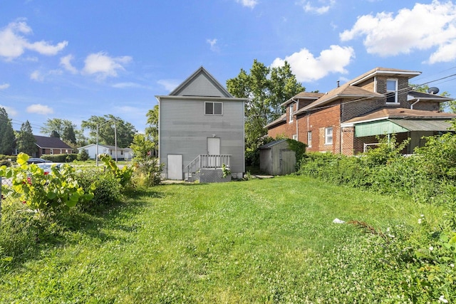 161 E 25th St, Chicago Heights, IL 60411 - rear view of property with a lawn