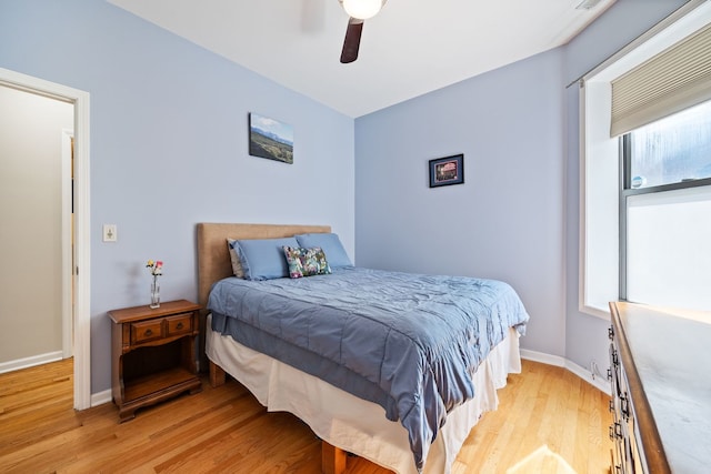 4705 N Campbell Ave Unit 3, Chicago, IL 60625 - bedroom with light wood finished floors, baseboards, and ceiling fan