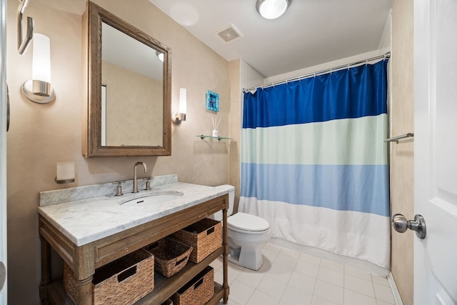 4705 N Campbell Ave Unit 3, Chicago, IL 60625 - full bath with toilet, vanity, tile patterned flooring, and a shower with curtain