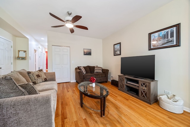 4705 N Campbell Ave Unit 3, Chicago, IL 60625 - living room with light wood-type flooring, ceiling fan, and baseboards