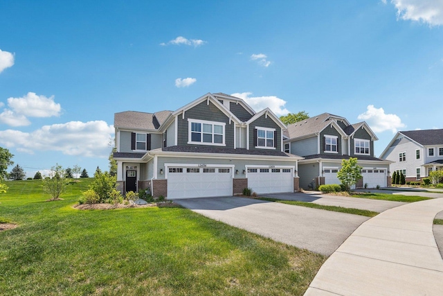 12654 S Talbot Cir, Plainfield, IL 60585 - craftsman inspired home featuring an attached garage, brick siding, driveway, and a front yard