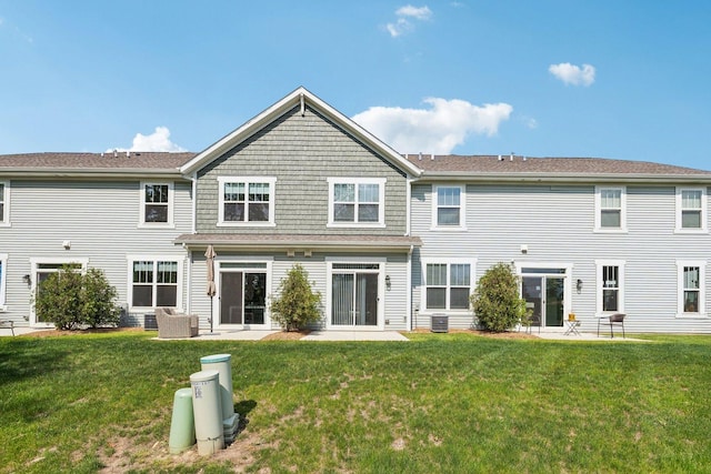 12654 S Talbot Cir, Plainfield, IL 60585 - rear view of house with a lawn and central AC