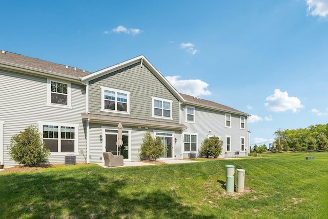 12654 S Talbot Cir, Plainfield, IL 60585 - rear view of property with a yard and central AC