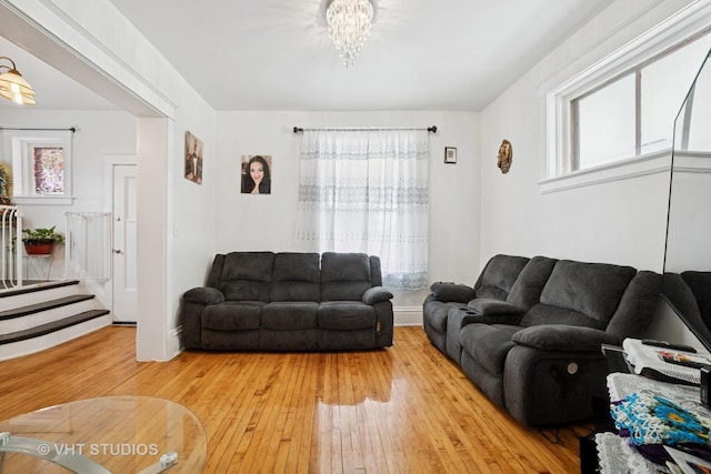 558 N Crystal St, Elgin, IL 60123 - living area featuring plenty of natural light, light wood-style flooring, and a chandelier