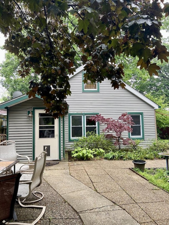 2110 N Mobile Ave, Chicago, IL 60639 - rear view of property featuring a patio area