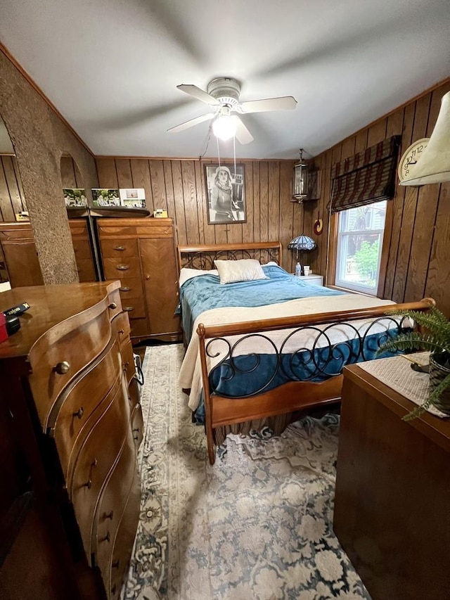 2110 N Mobile Ave, Chicago, IL 60639 - bedroom with wood walls and a ceiling fan