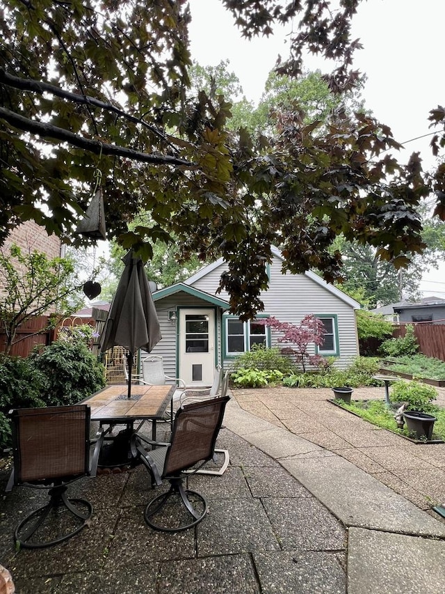 2110 N Mobile Ave, Chicago, IL 60639 - view of patio featuring outdoor dining area