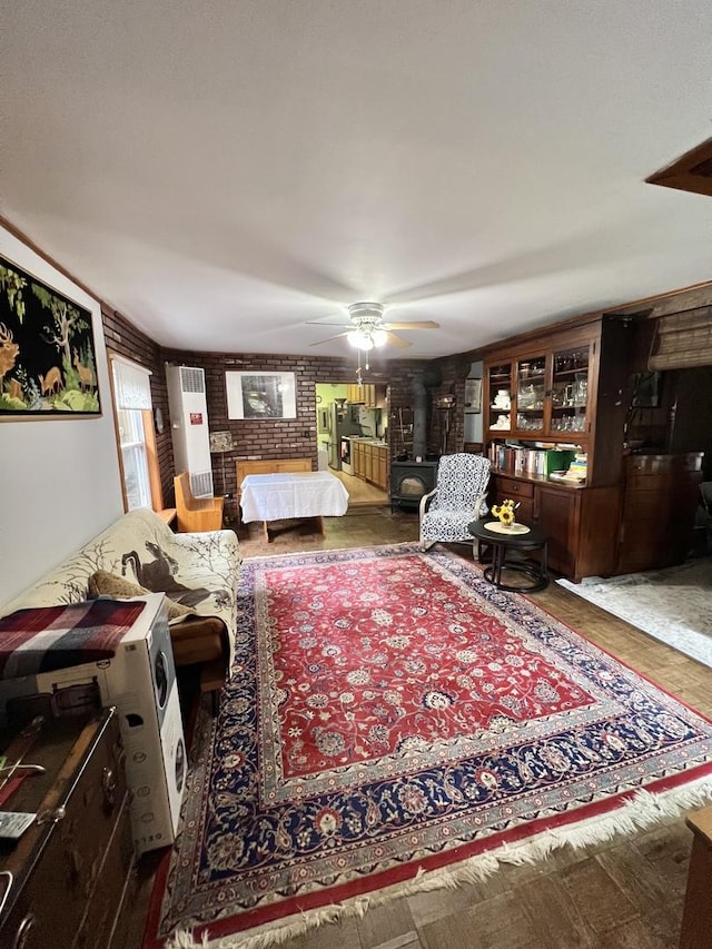 2110 N Mobile Ave, Chicago, IL 60639 - bedroom featuring a wood stove and wood finished floors