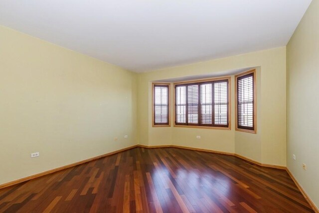 17100 Como Ave, Lockport, IL 60441 - spare room with plenty of natural light, wood finished floors, and baseboards