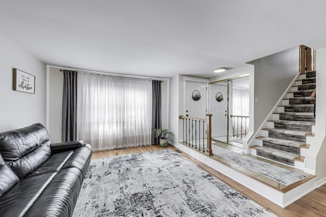 6 Plover Ct, Woodridge, IL 60517 - living area with wood finished floors, plenty of natural light, and stairs