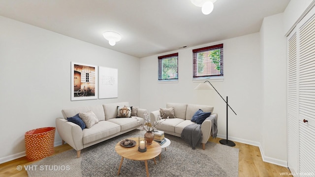 3649 W Cornelia Ave Unit C, Chicago, IL 60618 - living room with light wood-style floors and baseboards