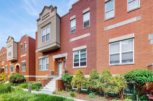 3649 W Cornelia Ave Unit C, Chicago, IL 60618 - view of front of house featuring brick siding
