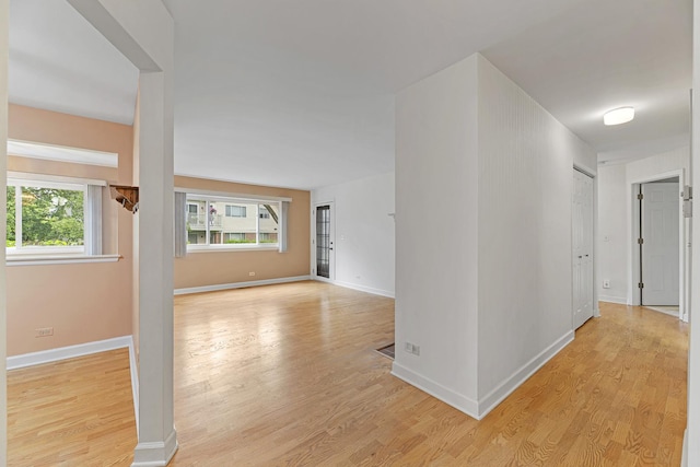 1604 Newburn Ct Unit D1, Wheeling, IL 60090 - hallway featuring light wood-style floors and baseboards