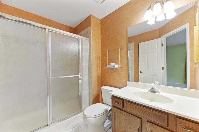 1604 Newburn Ct Unit D1, Wheeling, IL 60090 - full bathroom featuring toilet, vanity, a shower stall, and tile patterned floors