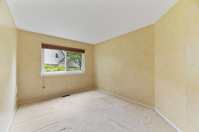 1604 Newburn Ct Unit D1, Wheeling, IL 60090 - carpeted empty room featuring baseboards
