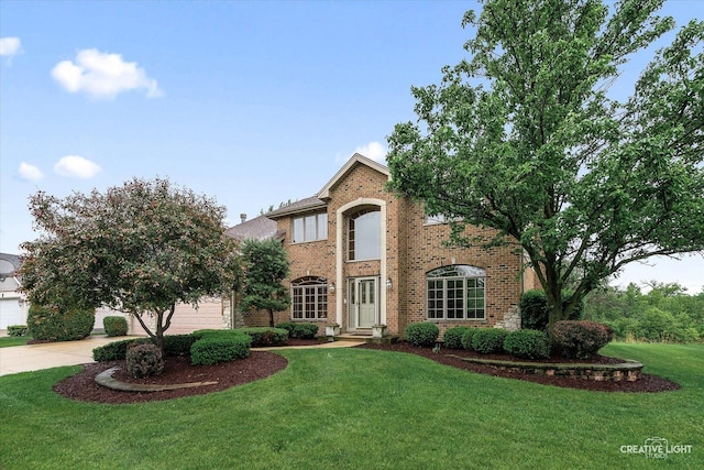 10521 Buck Dr, Orland Park, IL 60467 - traditional home featuring brick siding, driveway, a front lawn, and an attached garage