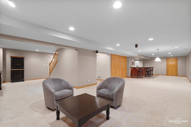 10521 Buck Dr, Orland Park, IL 60467 - living room featuring a bar, recessed lighting, light colored carpet, baseboards, and stairway
