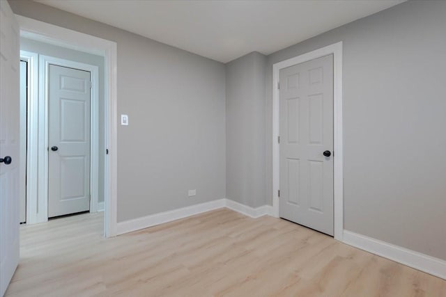 11521 S Aberdeen St, Chicago, IL 60643 - empty room with light wood-style flooring and baseboards